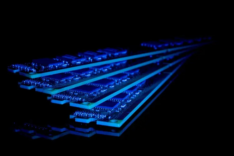 generic image of computer ram with dark background and blue light