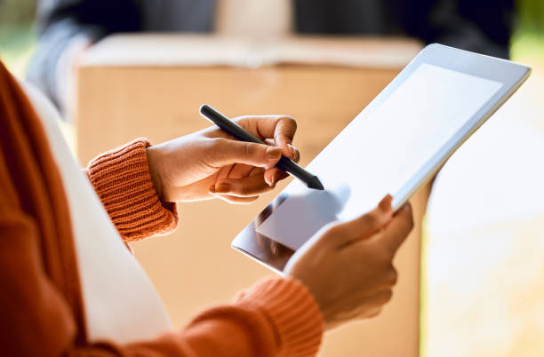 woman using a touch pen on a tablet